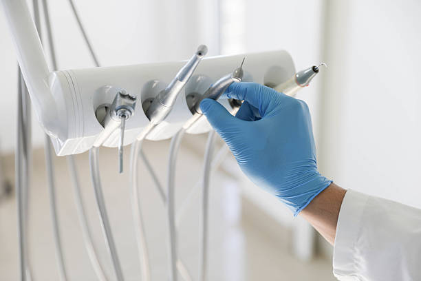 Professional Tooth Extraction technician working in Lawrenceville, VA
